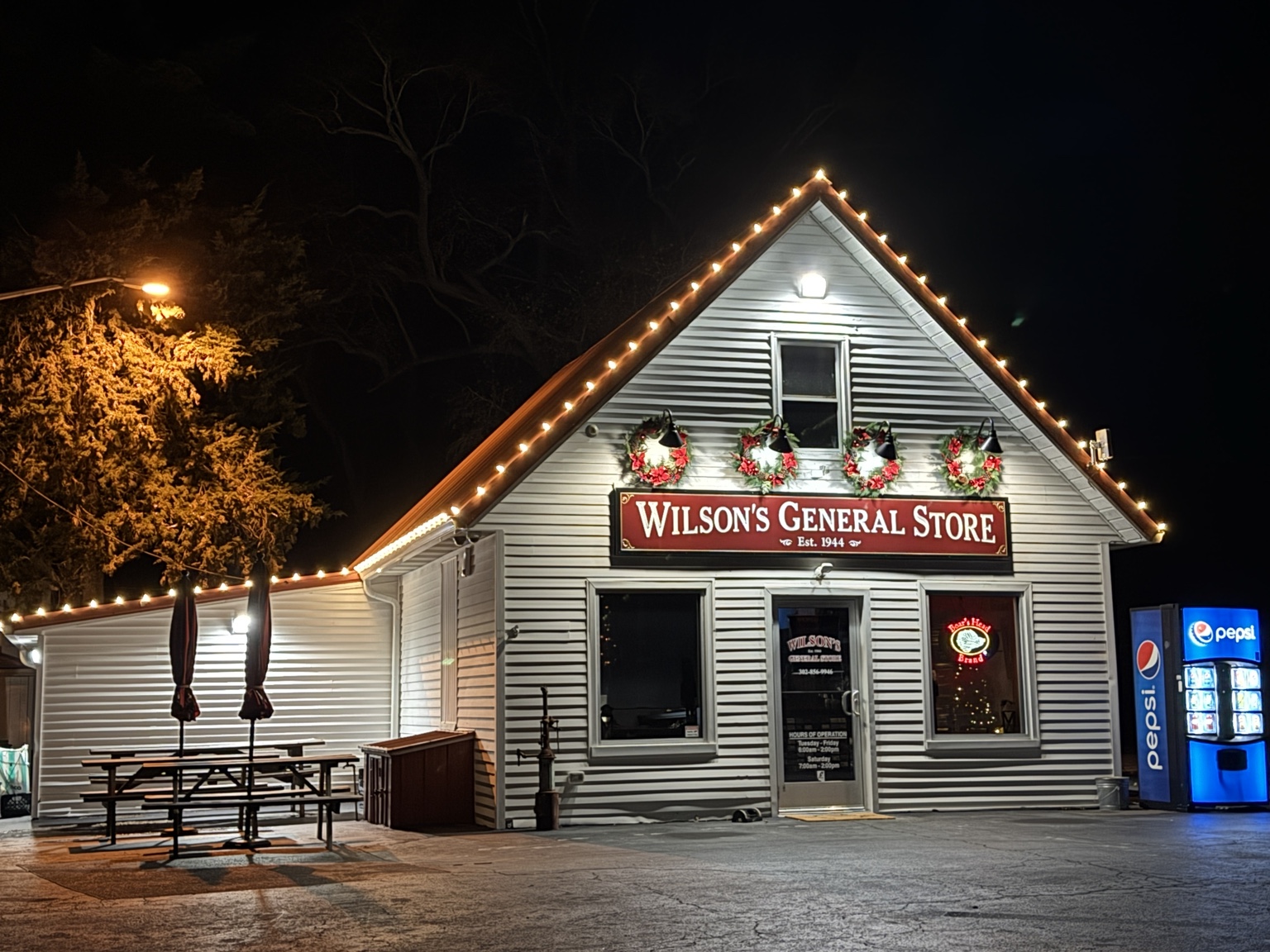 Commercial holiday lighting installed on Wilson's General Store
